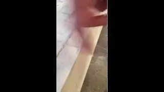 Thumbnail: Axel removing a piece of glue from a piece of wood