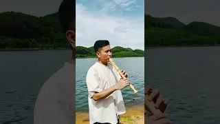 Thumbnail: Playing Musical Instrument next to the Lake shore #shorts #agnesmagicalmusic #flutemusic