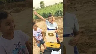 Thumbnail: Chiku & Nikku Unboxes Gold Play Button While playing JCB Toy #cnbrothers #jcb #cnvlogs #cntoys