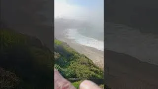 Thumbnail: Enjoying the sound of the waves.