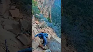 Thumbnail: Long way down🫣 #hiking #outdoors #zion #camping #viral #fyp #foryou #ytshorts #yt #reels #shorts #4k