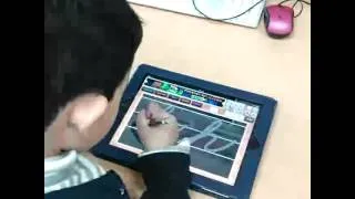Thumbnail: Preschool student with stylus & cursive iPad app (Technology Integration)