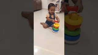 Thumbnail: 🧸❤️My 1-Year-Old Baby Mastered Stacking Rings! So Proud! #youtubeshorts #viralshorts #stackingrings