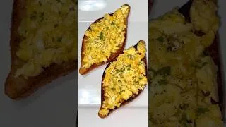 Thumbnail: Cheesy scrambled egg boats #crispytoast #eggtoast #cheesyeggs #breakfastrecipe #weekendrecipe