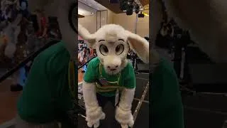 Thumbnail: Fursuiting as Asriel Dreemurr in front of a fan at Furry Migration 2023 #fursuit #FurryMigration