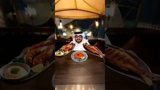 Thumbnail: فهد البشرى يتذوق المأكولات البحرية في سوق السمك بميناء الدوحة! 🐟🍴