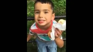 Thumbnail: Little cute kid having the best hot dog ever