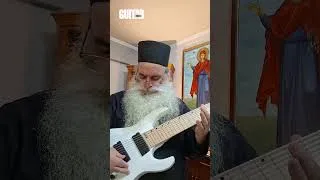 Thumbnail: Greek Orthodox priest Father Dionysios Tabakis and his 8-string electric guitar