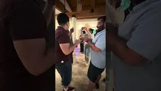 Thumbnail: Feeding Church Friend Charlie Pumpkin Squash Baby Food for a Baby Shower Game