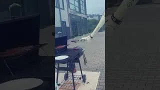 Thumbnail: Kawasaki Robotics cobot grilling sausages on the barbecue 😎