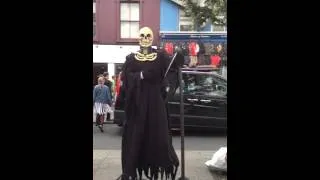 Thumbnail: Floating Grim Reaper mime act Camden market, Camden Town, London UK