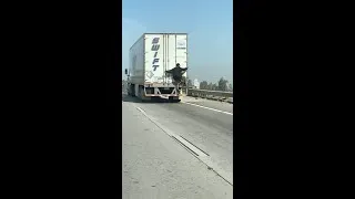 Thumbnail: Man seen riding on back of semi truck on Hwy 99