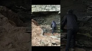 Thumbnail: Building a cliff shelter #survival #bushcraft #build