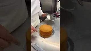 Thumbnail: How to evenly cut a cake into 3 layers with Chef Julie Walsh  #pastry #cake   #shorts #shortsfeed