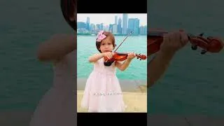 Thumbnail: 3 Year Old Playing Violin by Lake Michigan