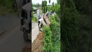 Thumbnail: Land Filling Like a Pro! KOMATSU + 5Ton Truck 💪 #ConstructionWork #DumpTruck #Shorts