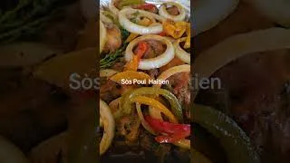 Thumbnail: Haitian chicken in sauce.