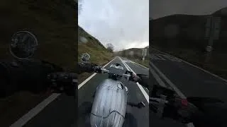 Thumbnail: Riding a Triumph Bonneville T120 in the rain on Snake Pass in January.