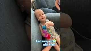 Thumbnail: My mom was told to abort me I would be incompatible with life.  I’m overhear living my best life😉