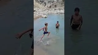 Thumbnail: When Courage Knows No Age; A Nomad Boy Swims in the Wild River of Khersan
