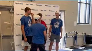 Thumbnail: Cooper and Ace Flagg taking pictures at their youth basketball camp