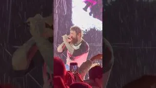 Thumbnail: Post Malone performs through the downpour #postmalone #viralvideo #shorts