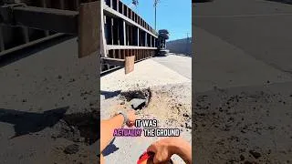 Thumbnail: Container Sinks Thru Asphalt & Rolls Over