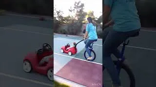 Thumbnail: Quite the talent! Teen unicycler pushes baby around while riding.
