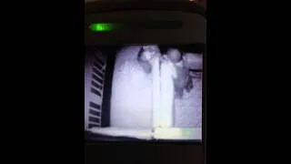 Thumbnail: Twins playing together through crib!!