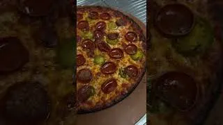 Thumbnail: Small but mighty pizza shop inside a convenience store.