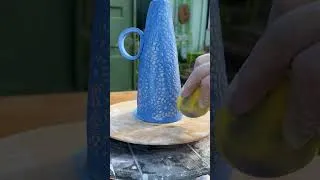 Thumbnail: Bringing texture to life on this handmade pottery clay oil bottle 💙