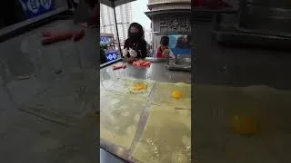 Thumbnail: A First-Person Look at Grilled Cold Noodles on a Chinese Street Griddle