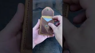 Thumbnail: Purchase the wallet in the description under the video