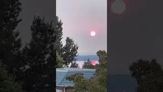 Thumbnail: Sun setting in wildfire smoke haze, 12 August 2026
