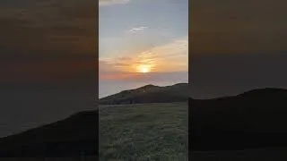Thumbnail: Watching the sunrise on the East coast of Scotland.  #camping
