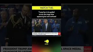 Thumbnail: Trump has to be guided across the stage after appearing lost and confused