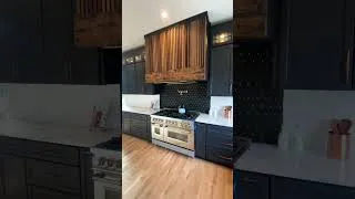 Thumbnail: Charcoal Navy and White kitchen accented with wood and gold 👏🏼 #kitchendesign #shorts #luxuryhomes
