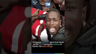 Thumbnail: Emotional mourners place their hands on the coffin carring the remains of Former PM Raila Odinga.