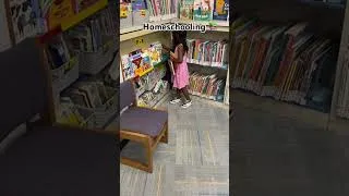 Thumbnail: Some days homeschooling is exploring other days its reading at the library 📚#shorts#short