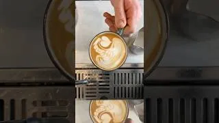 Thumbnail: Come for the swan and stay for the tulip… #coffee #coffeelatteart