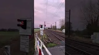 Thumbnail: Class 755404 passes over Burgess Drove Level Crossing #shorts