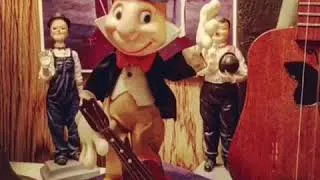 Thumbnail: JIMINY CRICKET JUGGLES A UKULELE