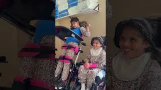 Thumbnail: standing frame activity and wrist splint therapy
