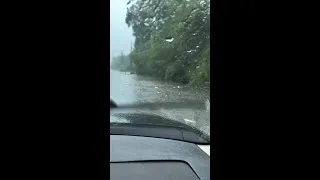 Thumbnail: Lott Road covered in water during flash flooding event