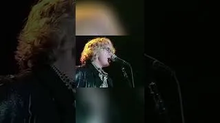 Thumbnail: R.E.M performing "Losing My Religion"